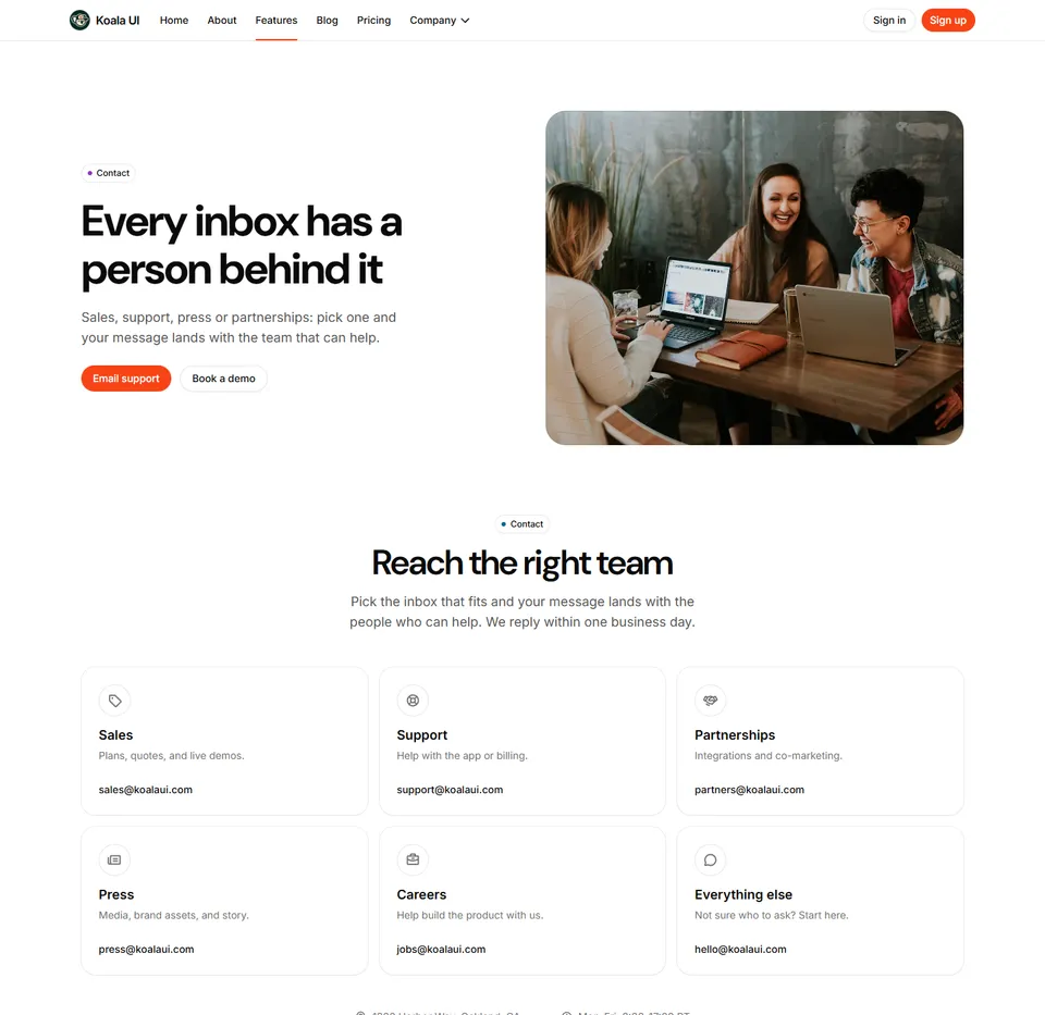 A contact page: a photo beside the heading, then a card per inbox